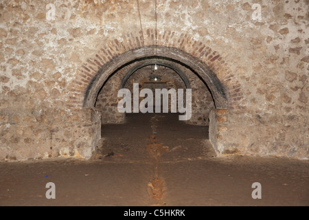 Maschio Dungeon Slave a Cape Coast Castle, un ex schiavo fortezza. Cape Coast, in Ghana Foto Stock