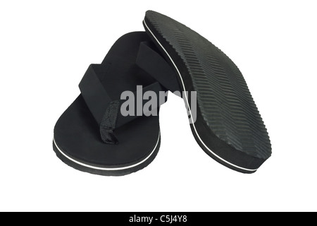 Coppia di nero flip flop calzature casual su sfondo bianco Foto Stock