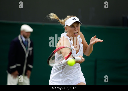 Caroline WOZNIACKI della Danimarca al 2011 campionati di Wimbledon Foto Stock