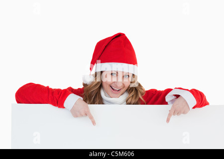 Attraente bionda donna vestiti da Babbo Natale Foto Stock