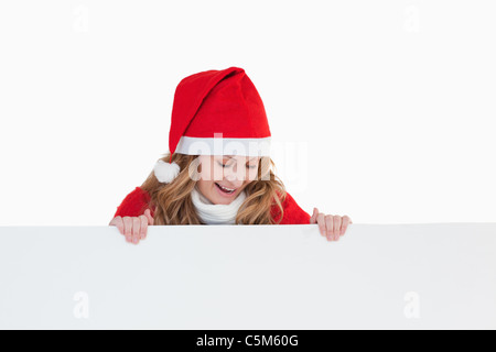 Felice bionda donna vestiti da Babbo Natale Foto Stock