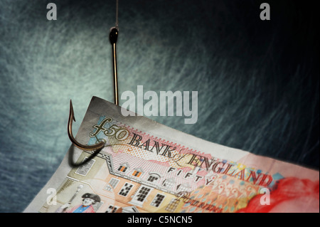 Una cinquantina di pound nota su un amo da pesca Foto Stock