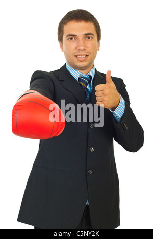 Business man dando pollice in alto e che mostra la mano nel guanto di boxe isolati su sfondo bianco Foto Stock