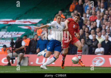 Sheffield United e gallese calciatore internazionale Ched Evans in azione contro l'Inghilterra. Foto Stock