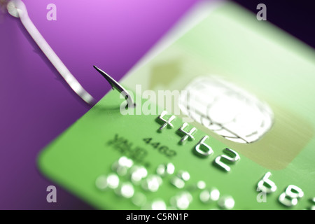 Agganciato sulla carta di credito Foto Stock