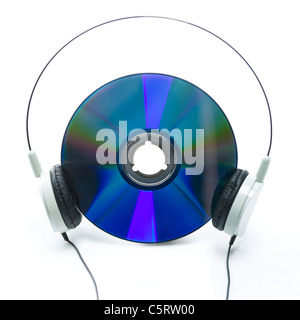 Un auricolare su CD Foto Stock