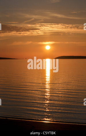 Vista al tramonto di Puffin Island da Ross on Wye costa del Galles settentrionale. Foto Stock