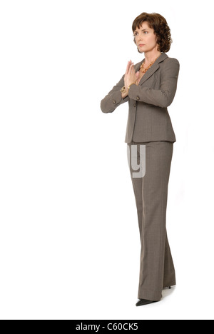 Donna attraente in ispirazione o posa meditativa Foto Stock