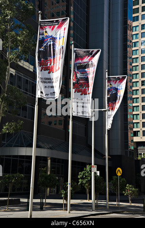Pubblicità bandiere su aste per sbandieratori per la Australian Formula Uno Motor Racing Grand Prix in Melbourne Victoria Australia Foto Stock