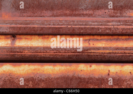 Sullo sfondo di un vecchio metallo arrugginito Foto Stock