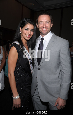 Miss Usa 2010 Rima Fakih, Hugh Jackman presso gli arrivi per i bambini della città 2010 beneficiano di Gala, Pier 60 in Moli Chelsea, New York, NY Settembre 30, 2010. Foto di: Rob ricco/Everett Collection Foto Stock