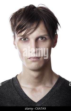 Mugshot di esaurito uomo su sfondo bianco Foto Stock