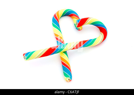 Coloratissima candy cane cuore su bianco Foto Stock