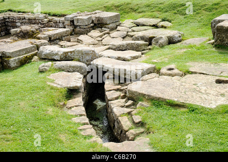 Pozzo romano al Chesters Fort, il vallo di Adriano, Inghilterra. Foto Stock