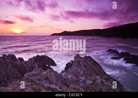 Tramonto sul Canale di Bristol da Barricane Beach, Woolacombe,guardando verso morte punto, North Devon, Inghilterra, Regno Unito Foto Stock