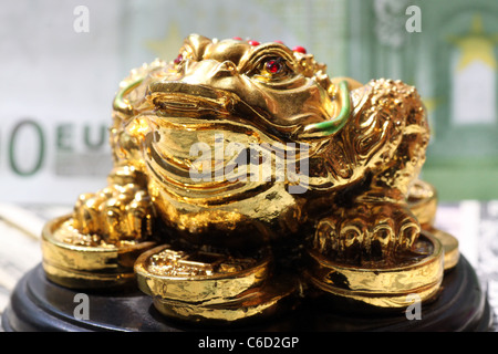 Fengshui denaro frog - simbolo della fortuna nella finanza Foto Stock