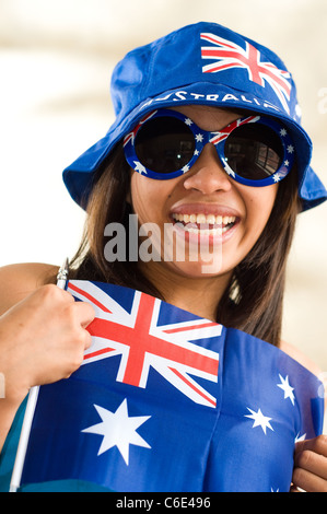Modello asiatico con colori australiano in studio di impostazione Foto Stock