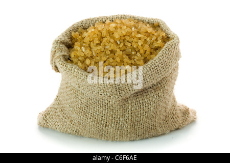 Un sano lo zucchero di canna nel piccolo sacco di tela Foto Stock