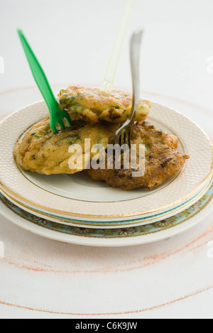 Pesce e frittelle alla citronella Foto Stock