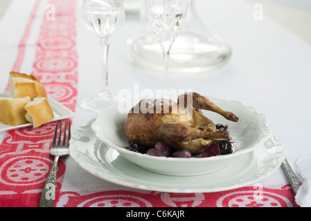 Brasato di quaglia con uva Foto Stock