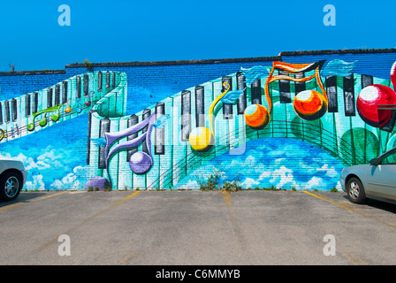 Dipinto murale sul lato dell'edificio a Dallas, Texas, Stati Uniti d'America Foto Stock