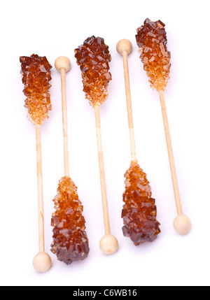 Brown ambra cristallo di zucchero sul bastone di legno Foto Stock