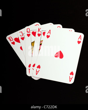 Un royal straight flush carte da gioco poker nei cuori Foto Stock