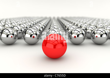 Il concetto di Leadership con sfera rossa e molte sfere cromate e la profondità di effetto di messa a fuoco Foto Stock