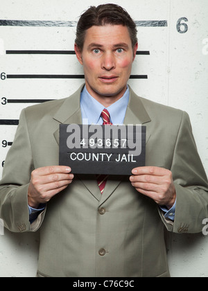 Studio mugshot di imprenditore Foto Stock