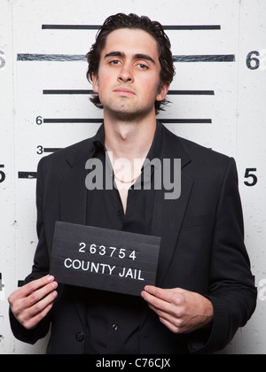 Studio mugshot di giovane Foto Stock