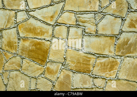 Texture di antichi muri di pietra come sfondo Foto Stock