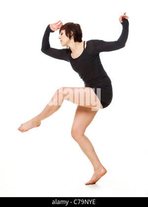 Studio shot della giovane donna dancing Foto Stock