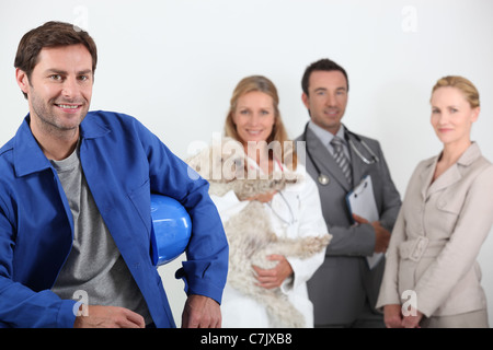 Quattro professionisti provenienti da diversi domini Foto Stock