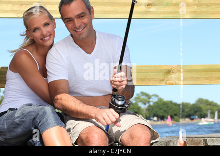 Accoppiare la pesca al sole Foto Stock