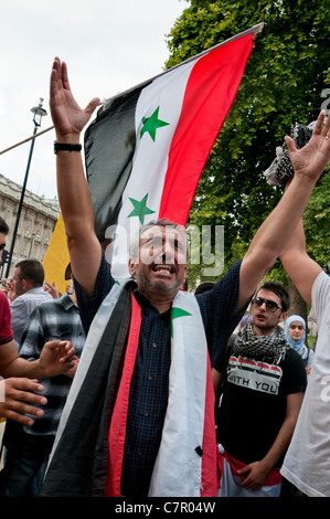 Siri che protestavano per il cambio di regime a Downing Street Londra Centrale Settembre 2011 Foto Stock