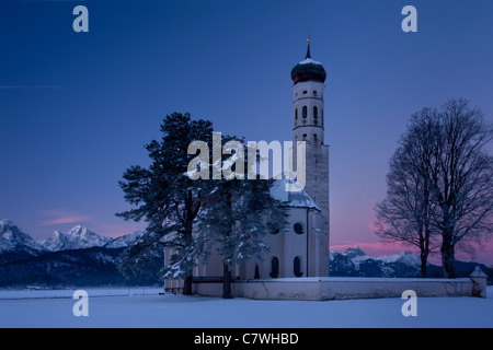 Alba d'inverno a San Coloman Chiesa a Schwangau Germania Foto Stock