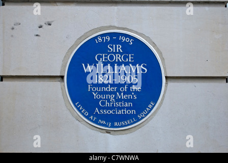 Targa blu segnando una casa di ymca fondatore sir George Williams, russell square, Londra, Inghilterra Foto Stock