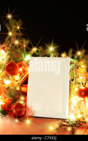 Il telaio da decorazioni di Natale. Isolamento su nero Foto Stock