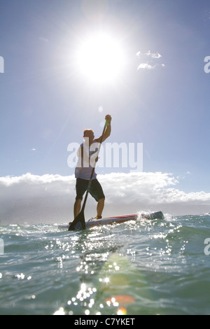 Pro stand up paddle board racer Foto Stock