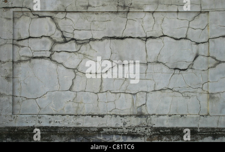 Danneggiato intonacata incrinato il pannello a parete per texture di sfondo Foto Stock