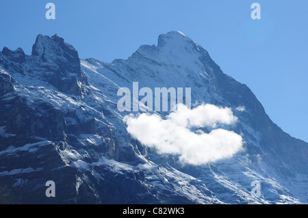 A nord dell'Eiger e una nuvola piccola, Oberland bernese, Svizzera Foto Stock