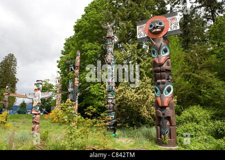 Totem Poles a Stanley Park, Vancouver BC Foto Stock