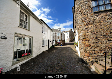 Strada di ciottoli nel villaggio delle ammaccature di Cumbria Foto Stock