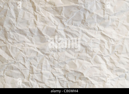 Crumpled carta crema effetto texture di sfondo astratto Foto Stock