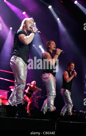 BELFAST, Regno Unito - 25 Maggio: Ronan Keating, Keith Duffy e Stephen Gately eseguire con Boyzone all'Odyssey Arena di Belfast Foto Stock