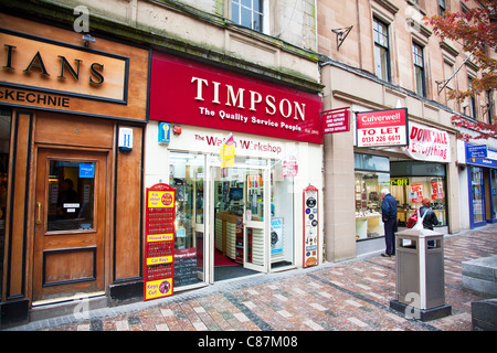 Stirling, Scozia, Timpson shoe repair e per il taglio di chiavi negozio di fronte al di fuori sulla strada zona shopping Foto Stock