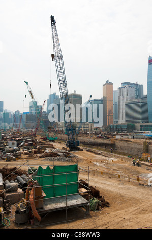 Bonifica di terreni per la costruzione di strade e di espansione su Hong Kong Isola nei pressi del porto di Victoria Hong Kong Cina Asia Foto Stock