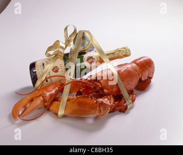 Aragosta, champagne e caviale Foto Stock