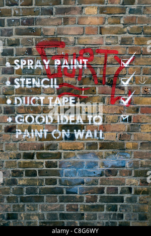 Mobstr Street arte dipinta su un muro di mattoni, Hanbury Street, Spitalfields, Londra, Regno Unito. Foto Stock