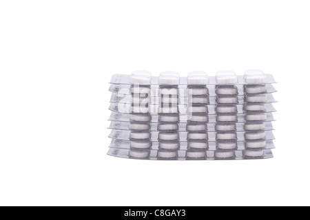 Pila di pillole. Immagine è isolato su sfondo bianco. Foto Stock